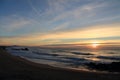 Travel to magnificent colorful scenery of atlantic ocean with breaking waves with mountain la rhune in sunset, capbreton, france Royalty Free Stock Photo