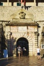 Travel to Montenegro. Tourists and visitors of the city enter the main gate of the fortress.