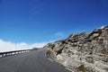 Travel to Norway, car asphalt road goes uphill over a cliff