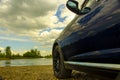 Travel to summer.Car on a country road on the background of the river Royalty Free Stock Photo