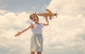 travel to summer. kid play wooden toy airplane. Study geography. Dreams about travel. Story about summer vacation. small