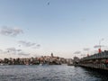 Travel to Turkey. Beautiful view of the Bosphorus Strait at sunset. Panormama overlooking the Galata bridge and Galata tower and