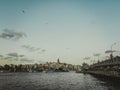 Travel to Turkey. Beautiful view of the Bosphorus Strait at sunset. Panormama overlooking the Galata bridge and Galata tower and