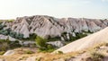 little orchard on rock slope in Uchisar village Royalty Free Stock Photo