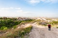 Tourist near little orchard in Uchisar village Royalty Free Stock Photo