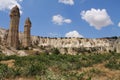 Travel to visit wonderful serie of troglodytes in love valley in blue sky, cappadocia, turkey Royalty Free Stock Photo