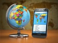 Travel and tourism concept. Mobile phone and globe. Royalty Free Stock Photo