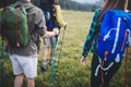 Travel, tourism, hike, gesture and people concept - group of smiling friends with backpacks Royalty Free Stock Photo