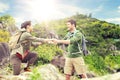 Couple with backpacks traveling over exotic island Royalty Free Stock Photo