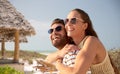 happy couple in sunglasses hugging on summer beach Royalty Free Stock Photo