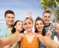 Happy friends taking selfie and showing peace Royalty Free Stock Photo