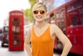 Happy teenage girl over london city street Royalty Free Stock Photo