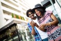 Travel, tourism, summer vacation, technology and friendship concept - smiling couple with tablet pc Royalty Free Stock Photo