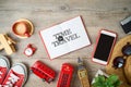 Travel and tourism to London, Great Britain background with note bokk and souvenirs on wooden table