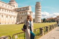 Travel tourists happy woman making selfie in front of leaning tower Pisa, Italy. Royalty Free Stock Photo