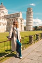 Travel tourists happy woman making selfie in front of leaning tower Pisa, Italy. Royalty Free Stock Photo