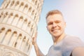 Travel tourists Man making selfie in front of leaning tower Pisa, Italy Royalty Free Stock Photo