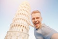 Travel tourists Man making selfie in front of leaning tower Pisa, Italy Royalty Free Stock Photo