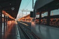 Travel by train concept. Empty station with train ready to leave. Sunset Autumn Light. Madrid, Spain