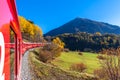 Travel with train in golden autumn