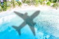 Travel traveling symbolic picture vacation sea airplane flying Seychelles beach Royalty Free Stock Photo