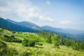 Travel, trekking, nature. Majestic, high green mountains. Horizontal frame Royalty Free Stock Photo