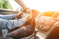 Travel trip car. Happy young man inside vehicle driving in sunny day. Fun driver ride in summer vacation concept Royalty Free Stock Photo