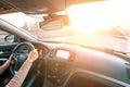 Travel trip car. Happy young woman inside vehicle driving in sunny day. Fun driver ride in winter vacation concept Royalty Free Stock Photo