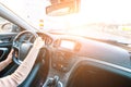 Travel trip car. Happy young woman inside vehicle driving in sunny day. Fun driver ride in winter vacation concept Royalty Free Stock Photo