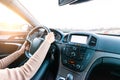 Travel trip car. Happy young woman inside vehicle driving in sunny day. Fun driver ride in winter vacation concept Royalty Free Stock Photo