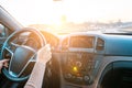 Travel trip car. Happy young woman inside vehicle driving in sunny day. Fun driver ride in winter vacation concept Royalty Free Stock Photo