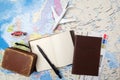 Travel , trip vacation, tourism mockup - close up note book, suitcase, toy airplane on map. Royalty Free Stock Photo