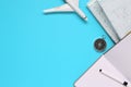 Travel , trip vacation, tourism mockup - compass, mobile phone, pen and toy airplane and touristic map on blue background. Copy sp Royalty Free Stock Photo