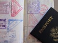 Travel or turism concept. American passport. Opened passport with visa stamps. Royalty Free Stock Photo