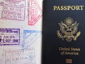 Travel or turism concept. American passport. Opened passport with visa stamps.