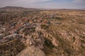 Travel Turkey - above view of Uchisar town and roads in valley in Nevsehir Province in Cappadocia in spring Royalty Free Stock Photo