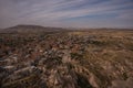 Travel Turkey - above view of Uchisar town and roads in valley in Nevsehir Province in Cappadocia in spring Royalty Free Stock Photo