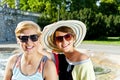 Travel two woman and sideseeing foutain with big smile