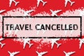 Travel, vacation ban, refund concept. Pattern of white airplanes with text travel cancelled on red background. Flight cancellation