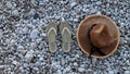 Travel vacation concept with flip flop sandals and beach staw Royalty Free Stock Photo