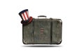 Travel Vintage Leather Suitcase With Uncle Sam`s Hat, NYC Sign and American Flag in Shape Of Statue of Liberty. Happy 4th of July Royalty Free Stock Photo