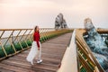 Travel woman at Golden Bridge in Ba Na Hills ,Danang Vietnam Royalty Free Stock Photo