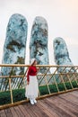 Travel woman at Golden Bridge in Ba Na Hills ,Danang Vietnam Royalty Free Stock Photo