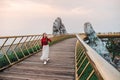 Travel woman at Golden Bridge in Ba Na Hills ,Danang Vietnam Royalty Free Stock Photo