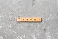Travel word written on wood block. Travel text on cement table for your desing, concept Royalty Free Stock Photo