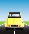 Travel - yellow retro car on road Royalty Free Stock Photo