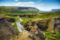 Traveler against picturesque Icelandic landscape.