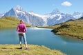 Traveler against Swiss Alps