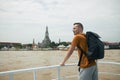 Traveler with backpack is enjoy view from ferry boat