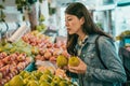 Traveler buying fruits in original farmers market Royalty Free Stock Photo